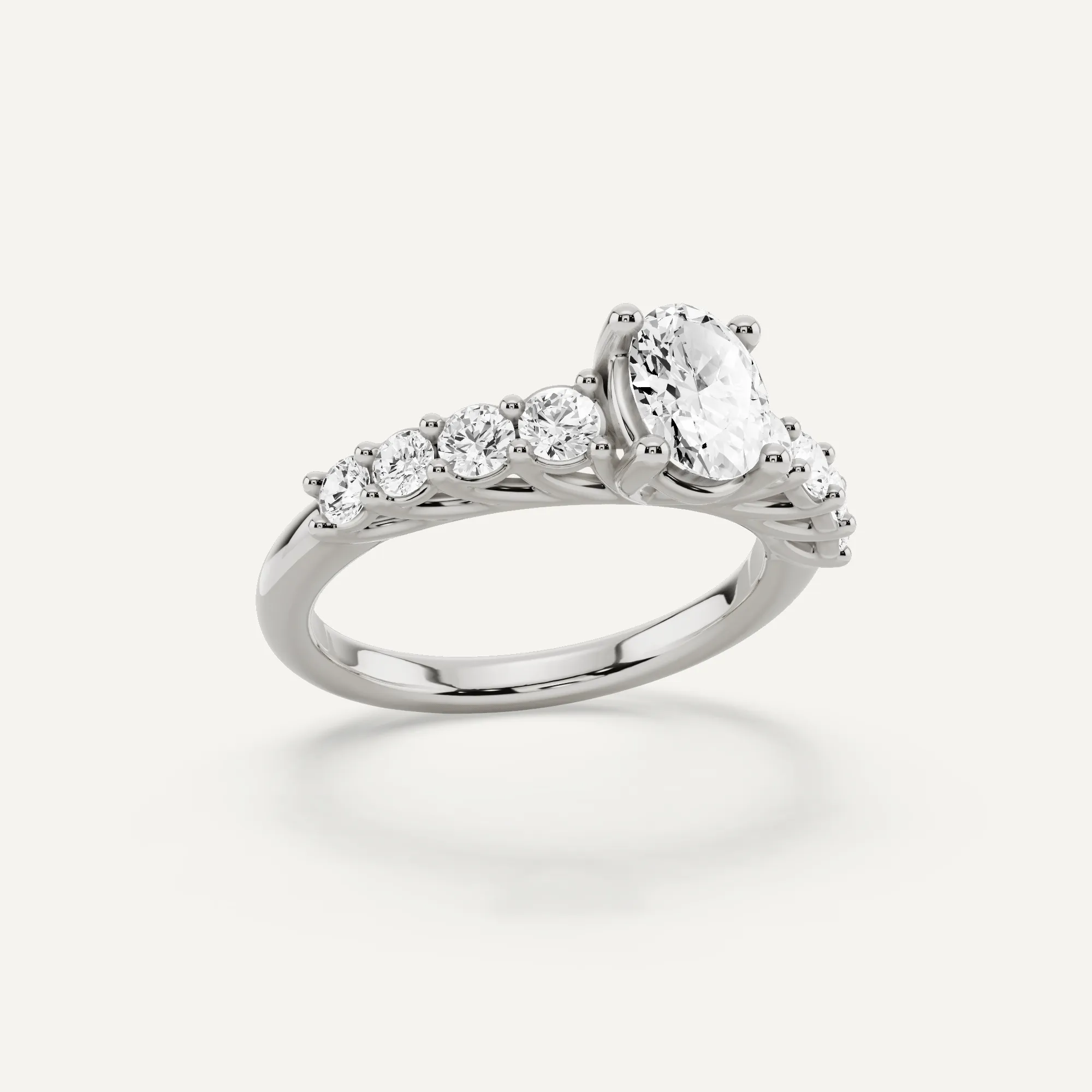 1 1/4 ctw Oval Diamond Graduating Side Stone Engagement Ring