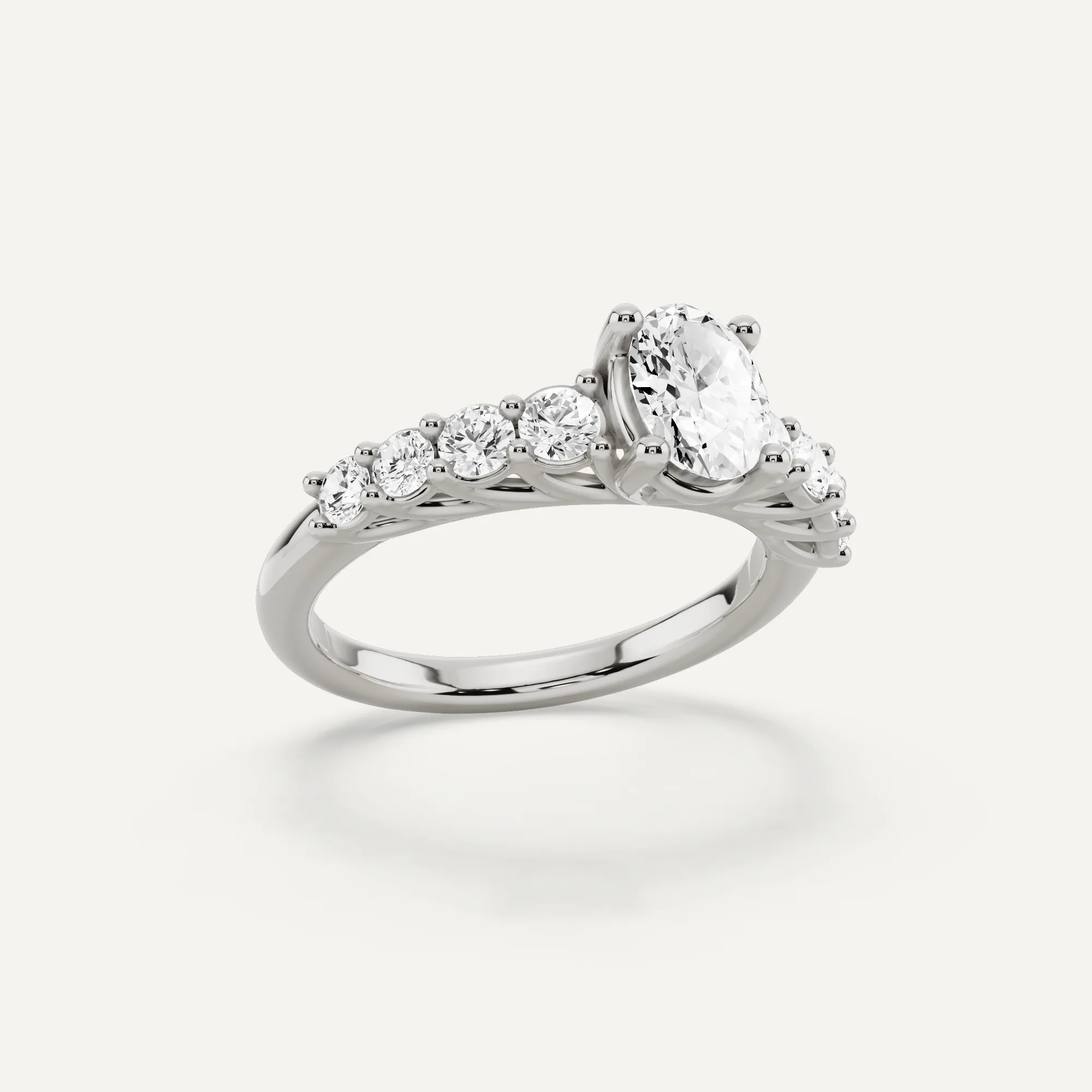 1 1/4 ctw Oval Diamond Graduating Side Stone Engagement Ring
