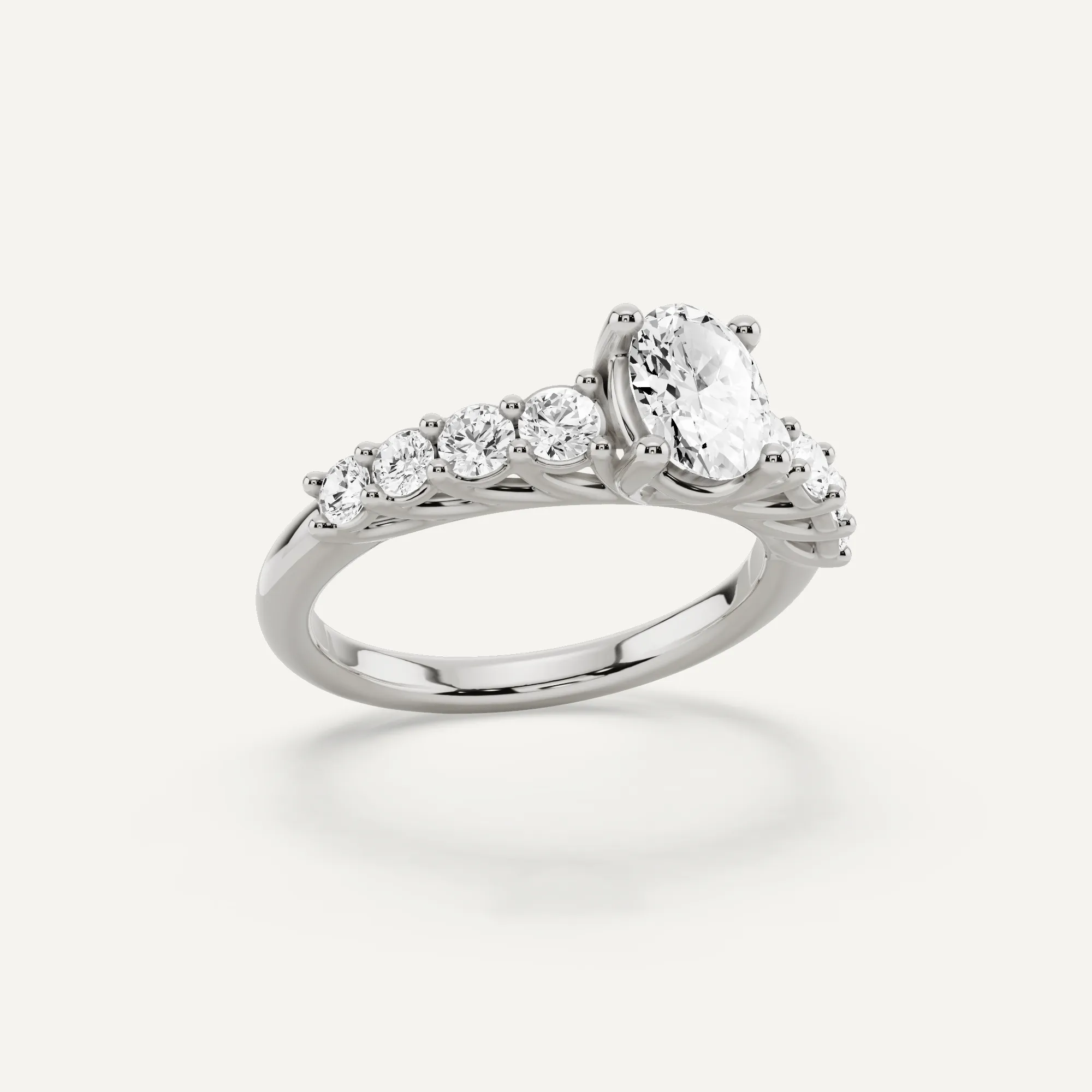 1 1/4 ctw Oval Diamond Graduating Side Stone Engagement Ring
