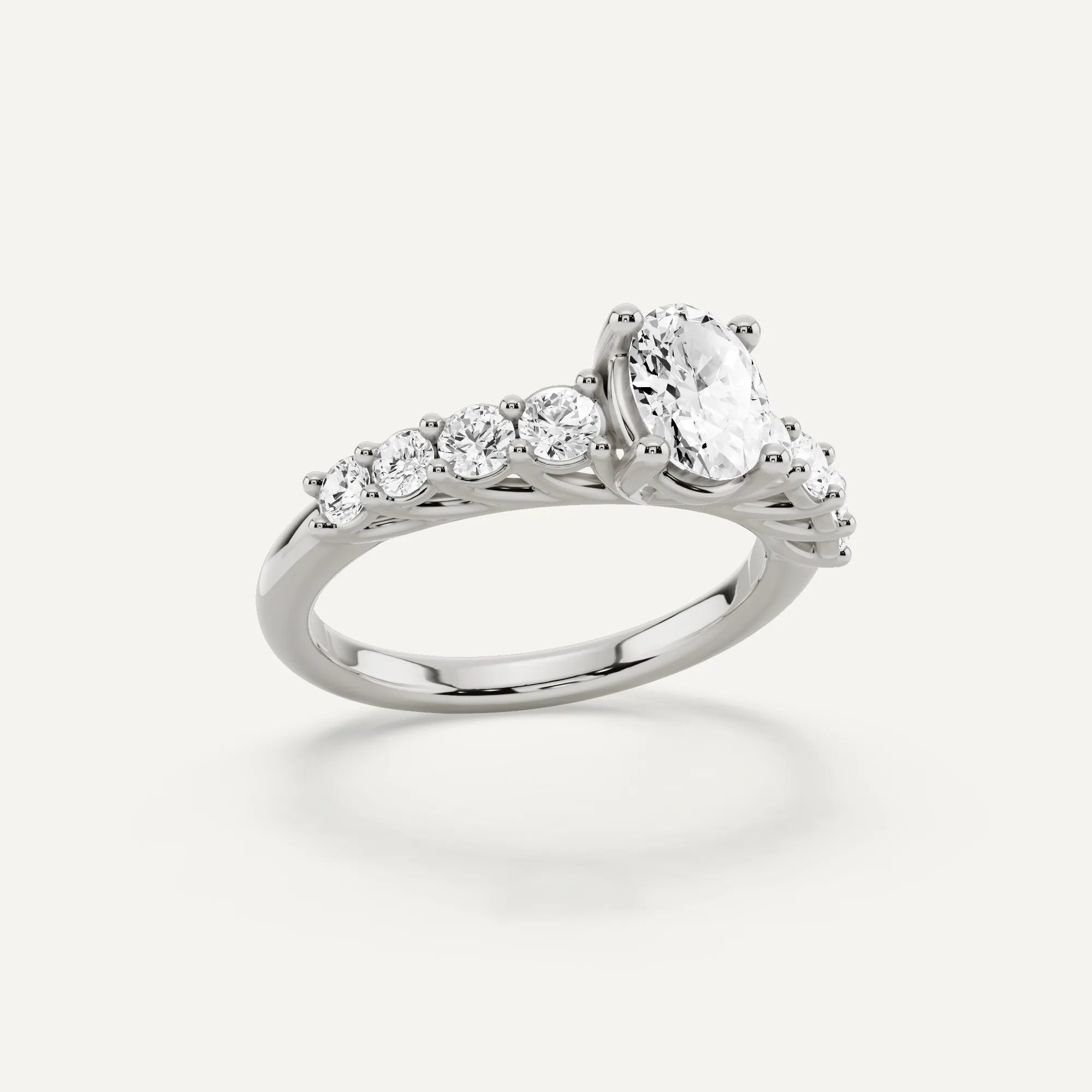 1 1/4 ctw Oval Diamond Graduating Side Stone Engagement Ring