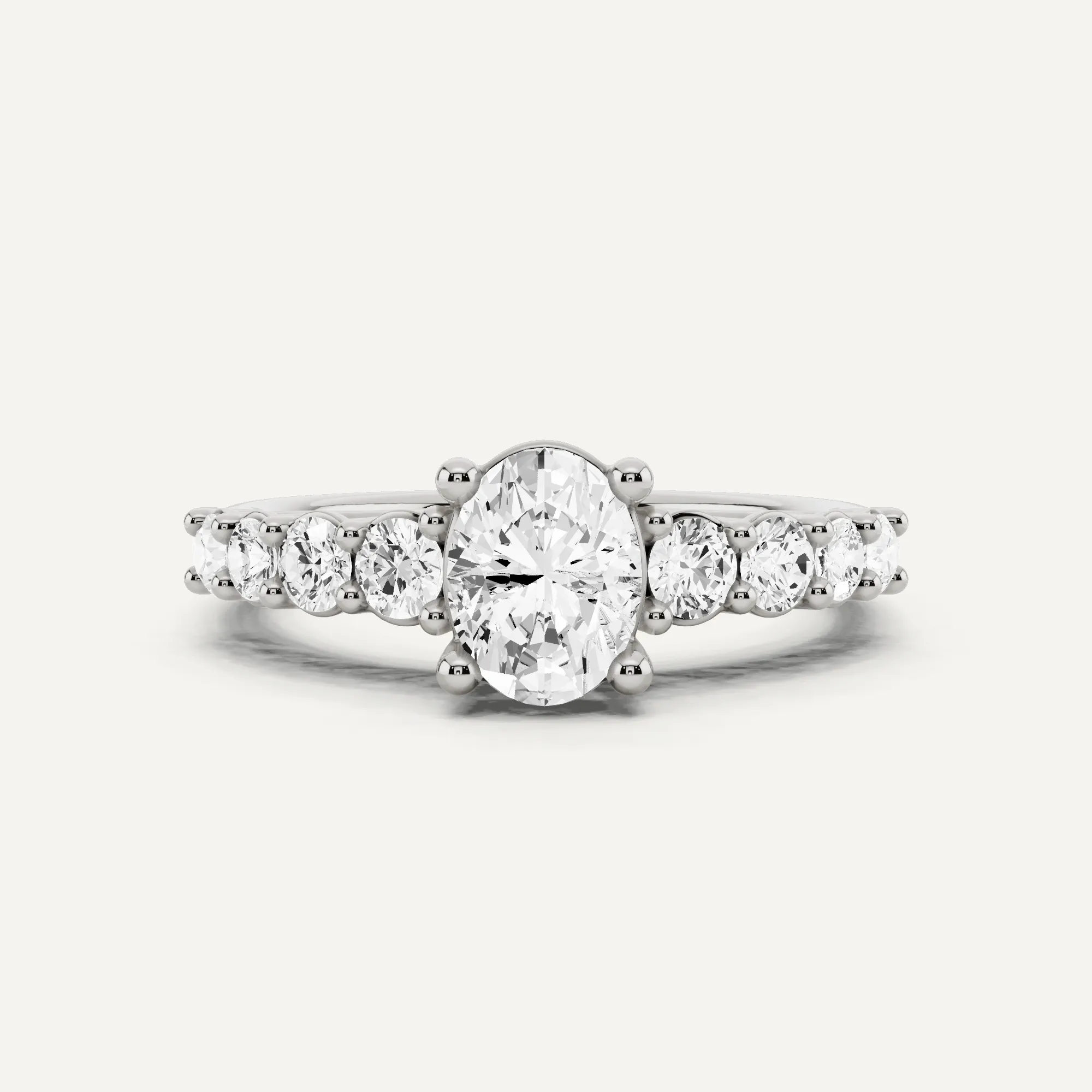 1 1/4 ctw Oval Diamond Graduating Side Stone Engagement Ring