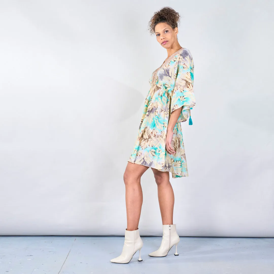 Floral bohemian midi dress with tassel detail wholesale