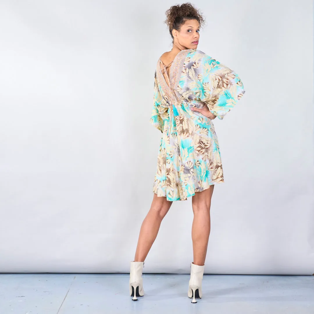 Floral bohemian midi dress with tassel detail wholesale