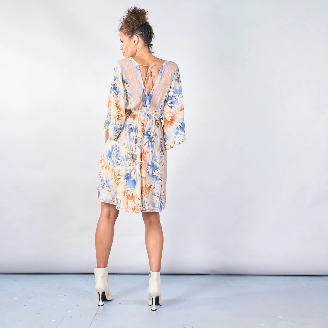 Floral bohemian midi dress with tassel detail wholesale