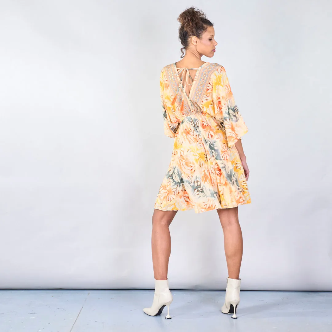 Floral bohemian midi dress with tassel detail wholesale