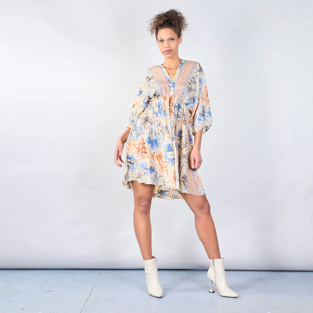 Floral bohemian midi dress with tassel detail wholesale