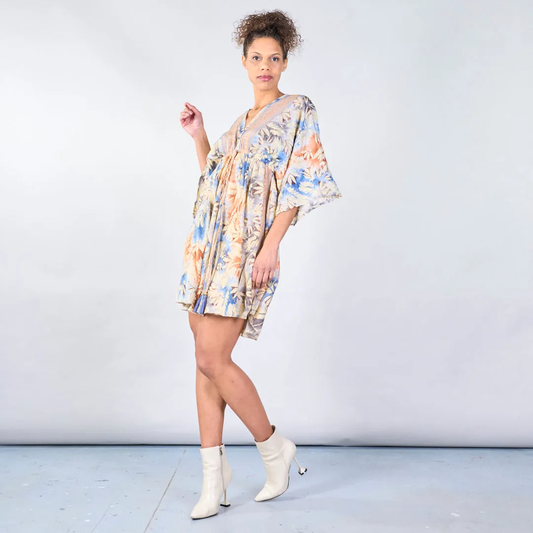 Floral bohemian midi dress with tassel detail wholesale